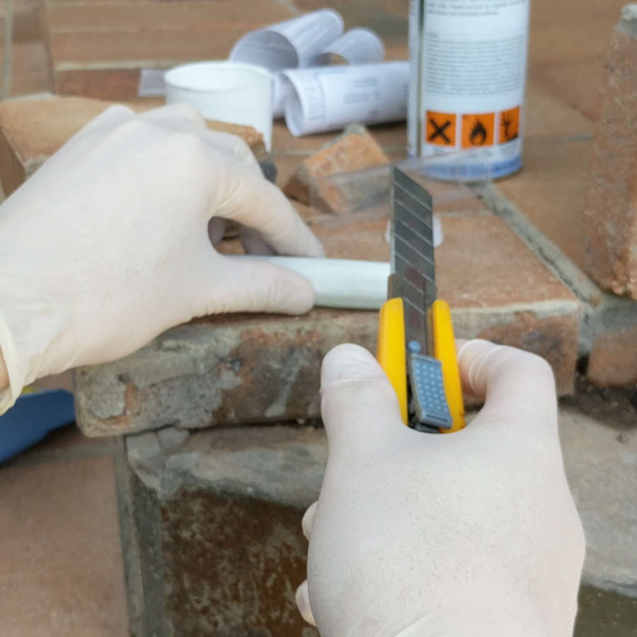Cutting off and preparing concrete repair stick putty